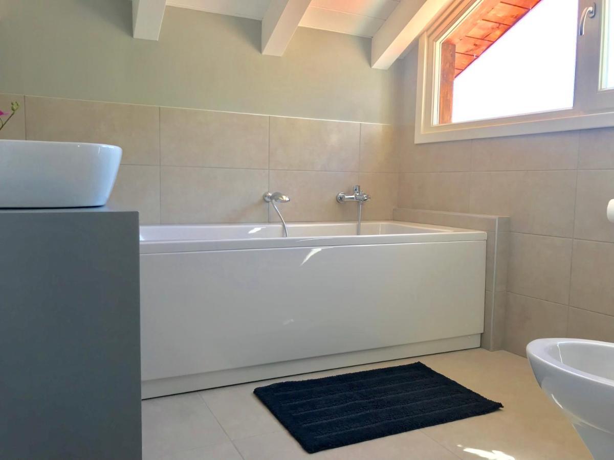 קנוביו Appartamento Cortile מראה חיצוני תמונה